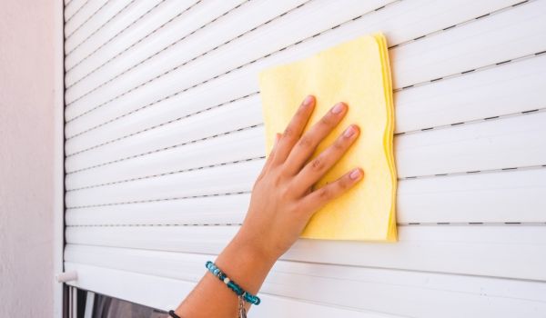 Wiping Garage Door | Garage Door Maintenance