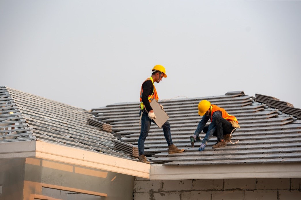workers in the roof